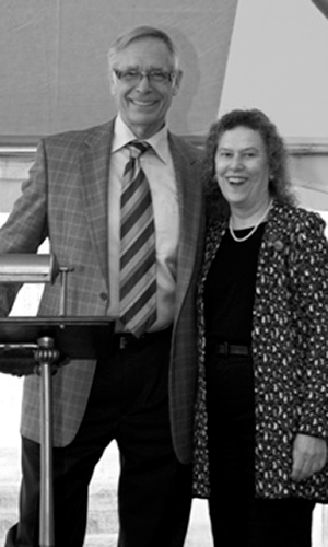 Judith A. Martin poses with President Robert Bruininks. Martin is holding her certificate.