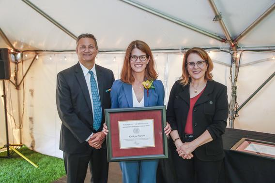 Photo of Kathryn Pearson with President Joan Gabel and Professor Mark Distefano, chair, President's Award for Outstanding Service Committee