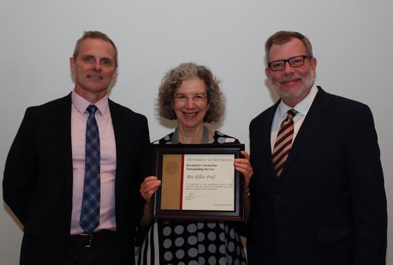 Recipient Riv-Ellen Prell receiving her award pictured with President Eric W. Kaler and Robert Geraghty, chair, President's Award committee.